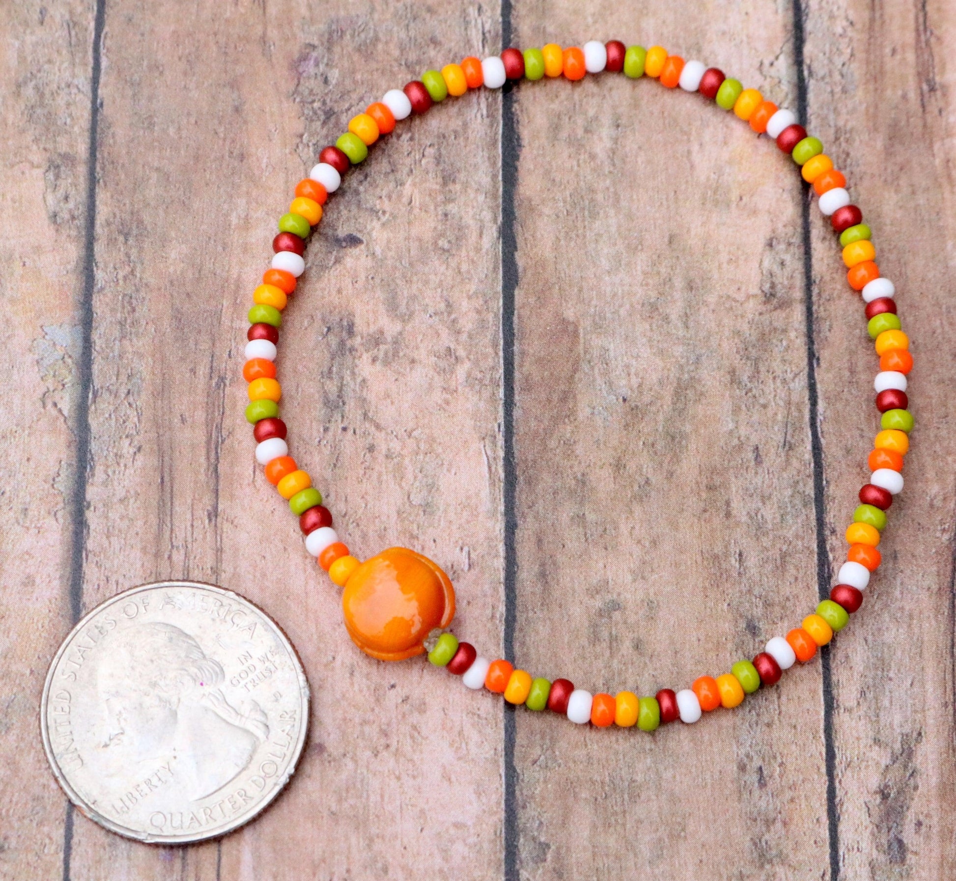Fall in Love with A Glass Orange Sun - Red, Yellow, Green, and White Glass Bracelet Coin Size Overview