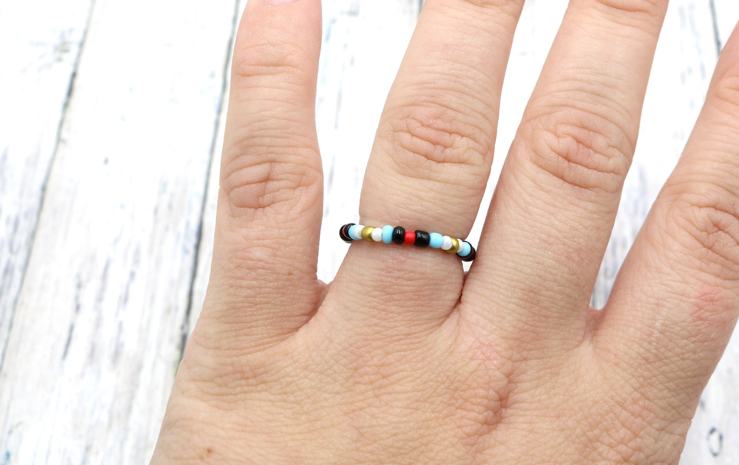 Pointing Your Finger Like an Egyptian Smooth Walking Glass Bead Stretch Stack Ring by Monkey's Mojo