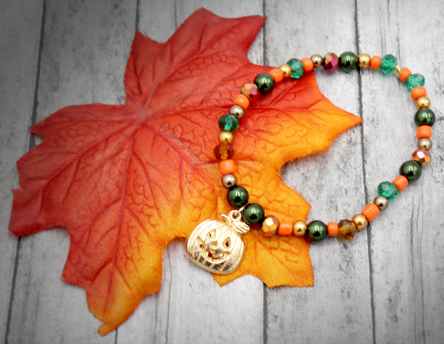 Crave Away the Night in The Pumpkin Patch Bracelet with Yellow Gold Pumpkin Charm by Monkey's Mojo