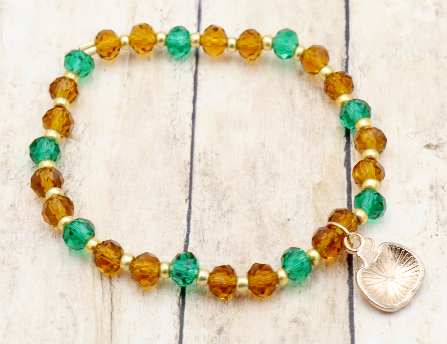 Faceted Orange and Green Scary Craved Pumpkin Patch Stretch Charm Bracelet by Monkeys Mojo