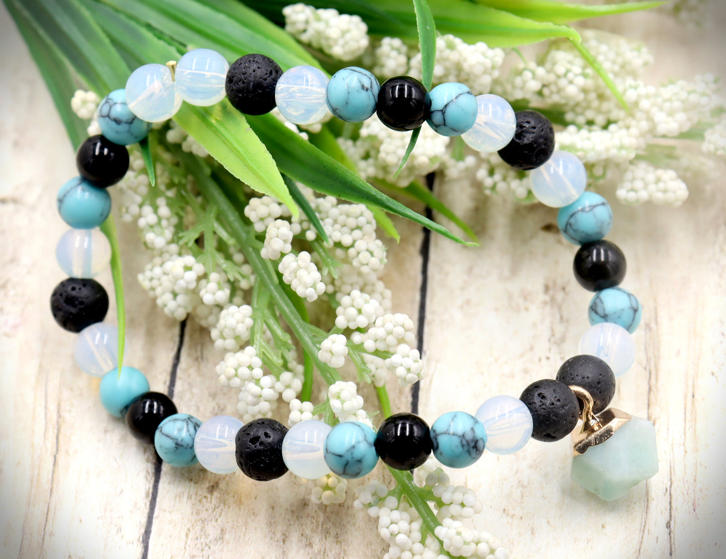 Head Over the Moon for Turquoise Blue and Black Lava Rock Golden Geometric Charm Bracelet