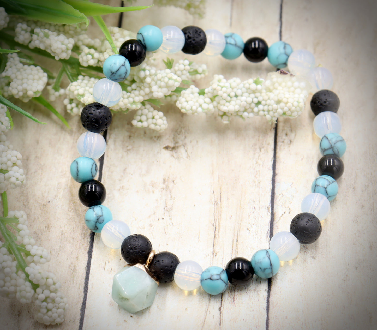 Head Over the Moon for Turquoise Blue and Black Lava Rock Golden Geometric Charm Bracelet