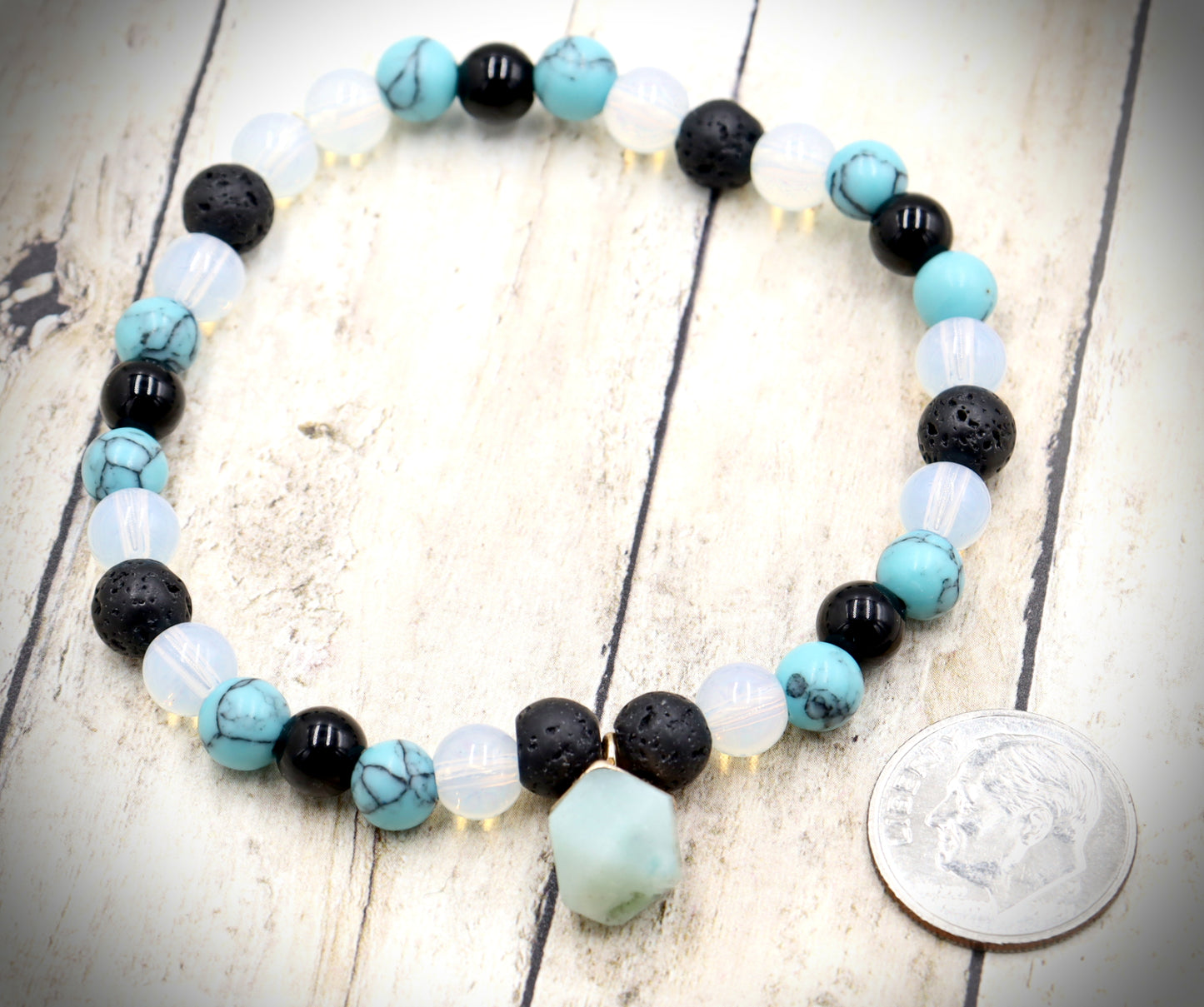Head Over the Moon for Turquoise Blue and Black Lava Rock Golden Geometric Charm Bracelet