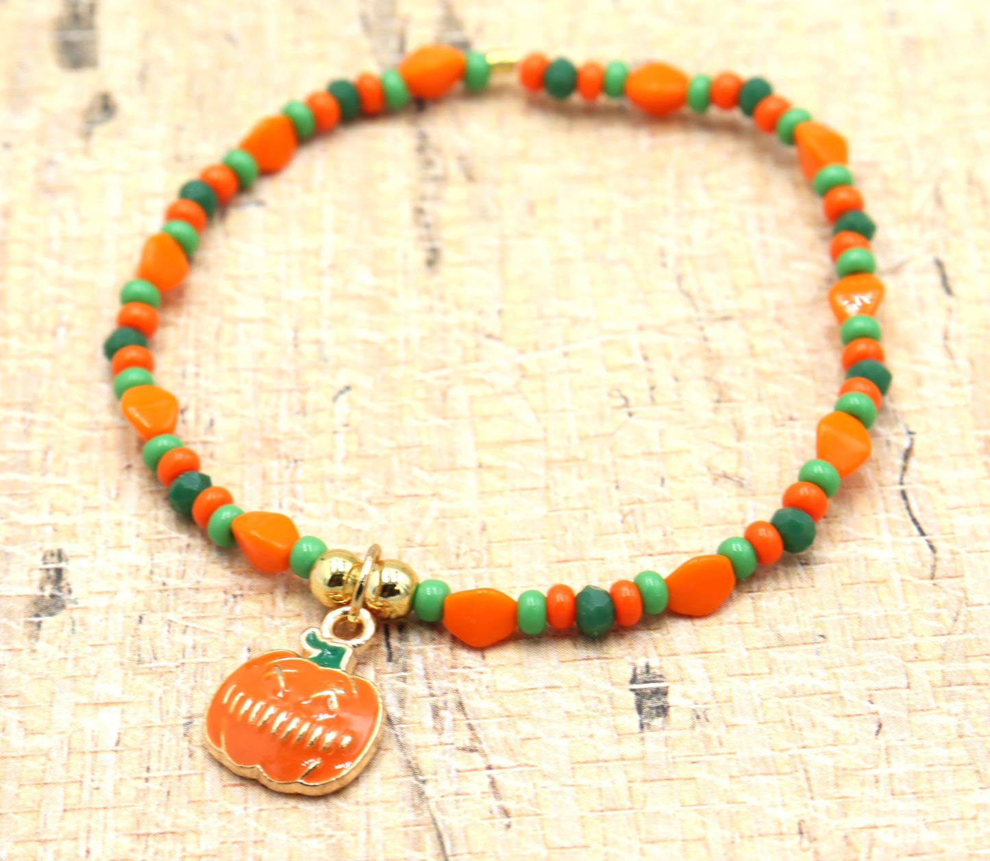 Orange and Green Scream Scary Craved Pumpkin Charm Bracelet by Monkey's Mojo Jewelry