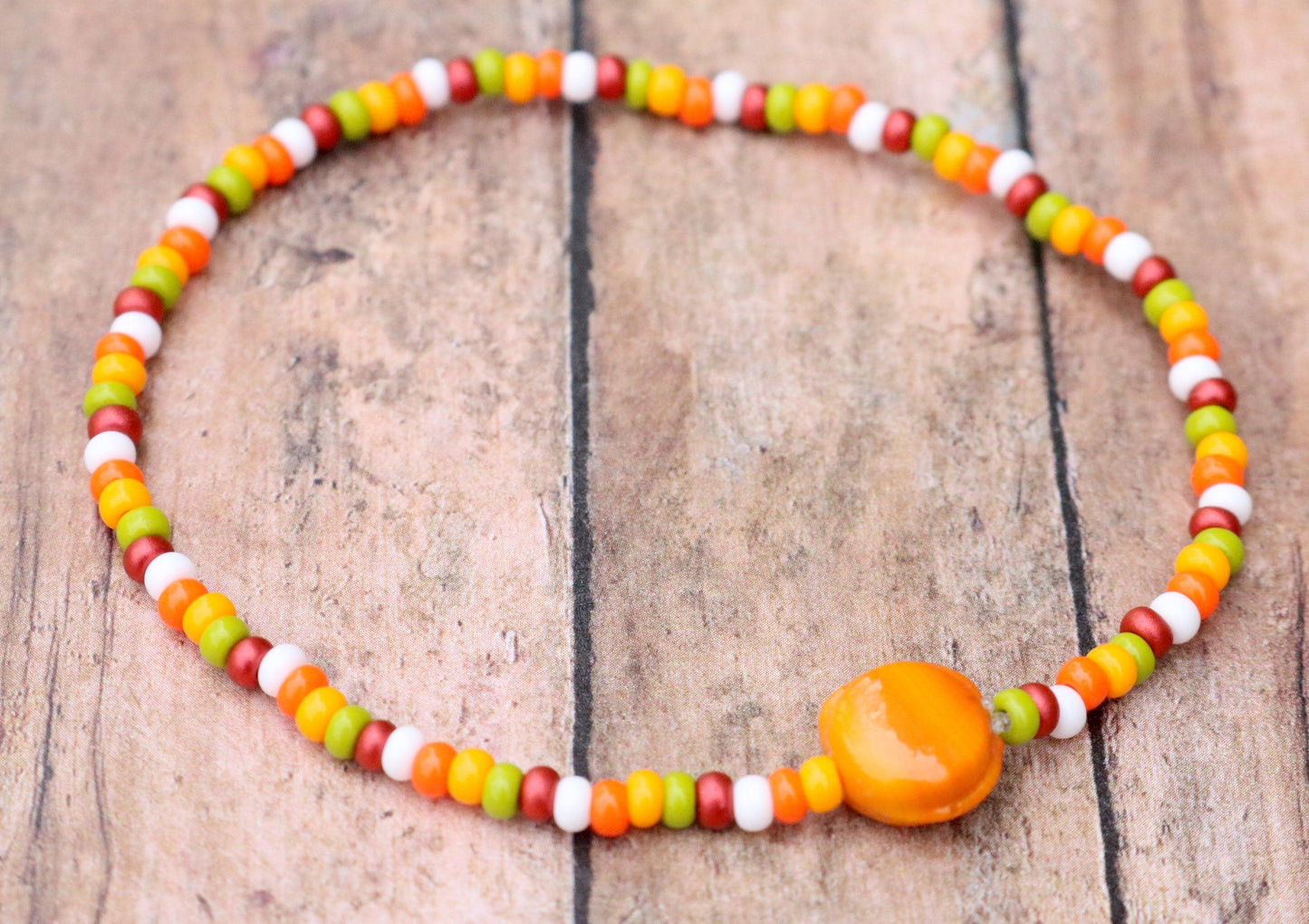 Fall in Love with A Glass Orange Sun - Red, Yellow, Green, and White Glass Bracelet Front View